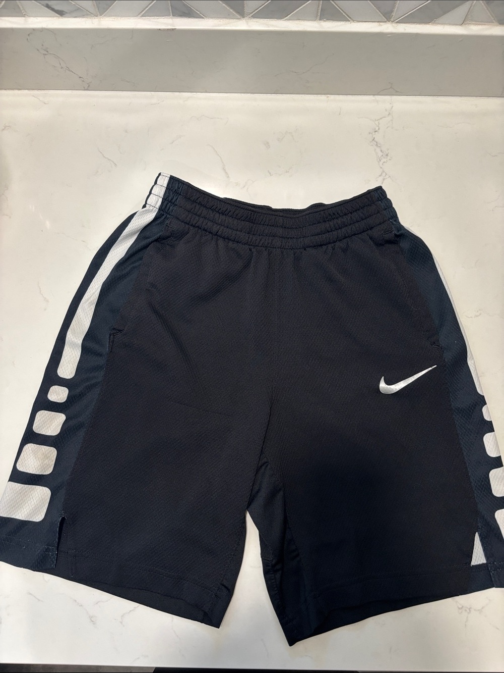Nike Black Performance Shorts with White Swoosh and Side Accents